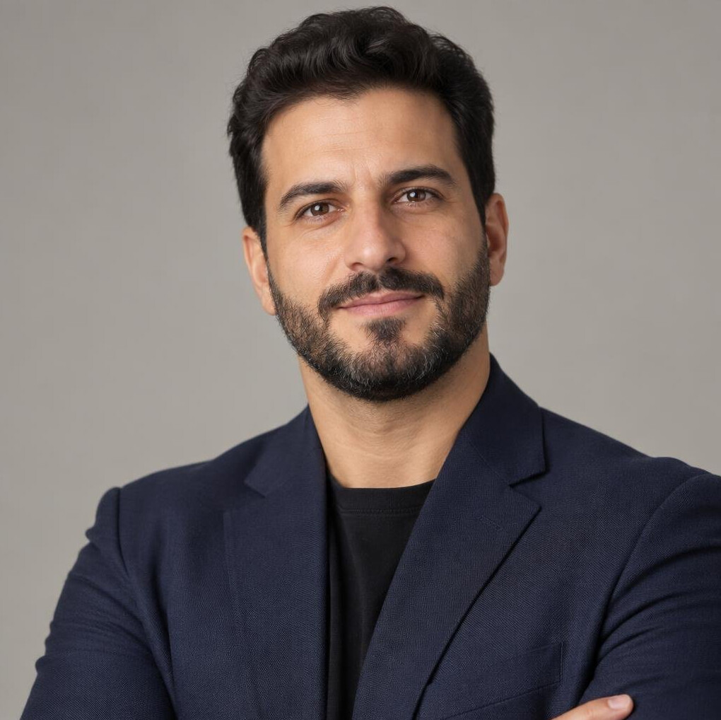 Portrait of a man with a beard looking at the camera